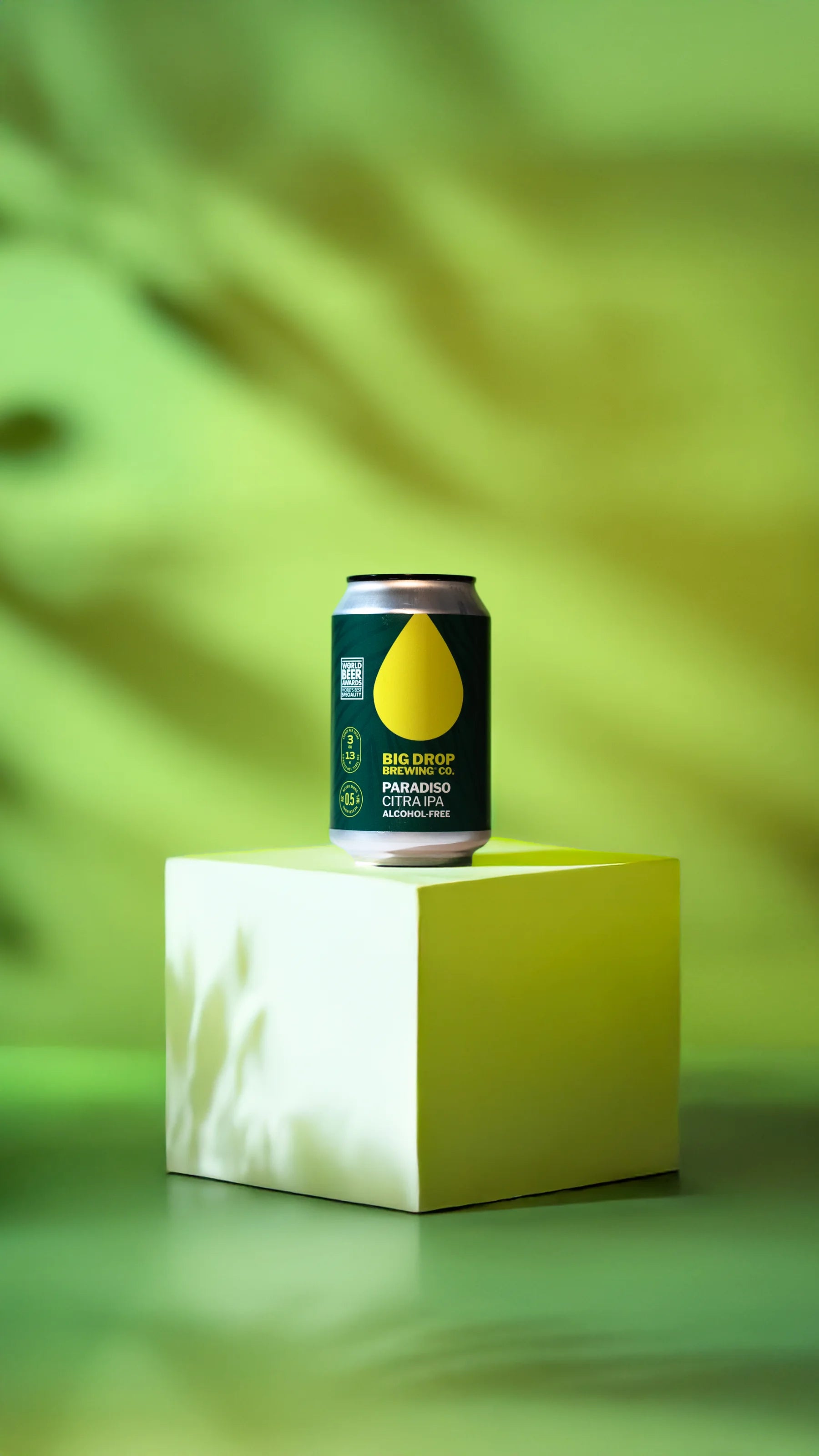 Paradiso Citra IPA on a sunlit green plinth